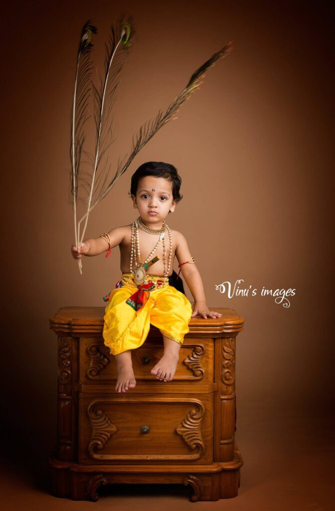 Baby boy in krishna outfit for janmastami photoshoot, by Vinus Images in Delhi