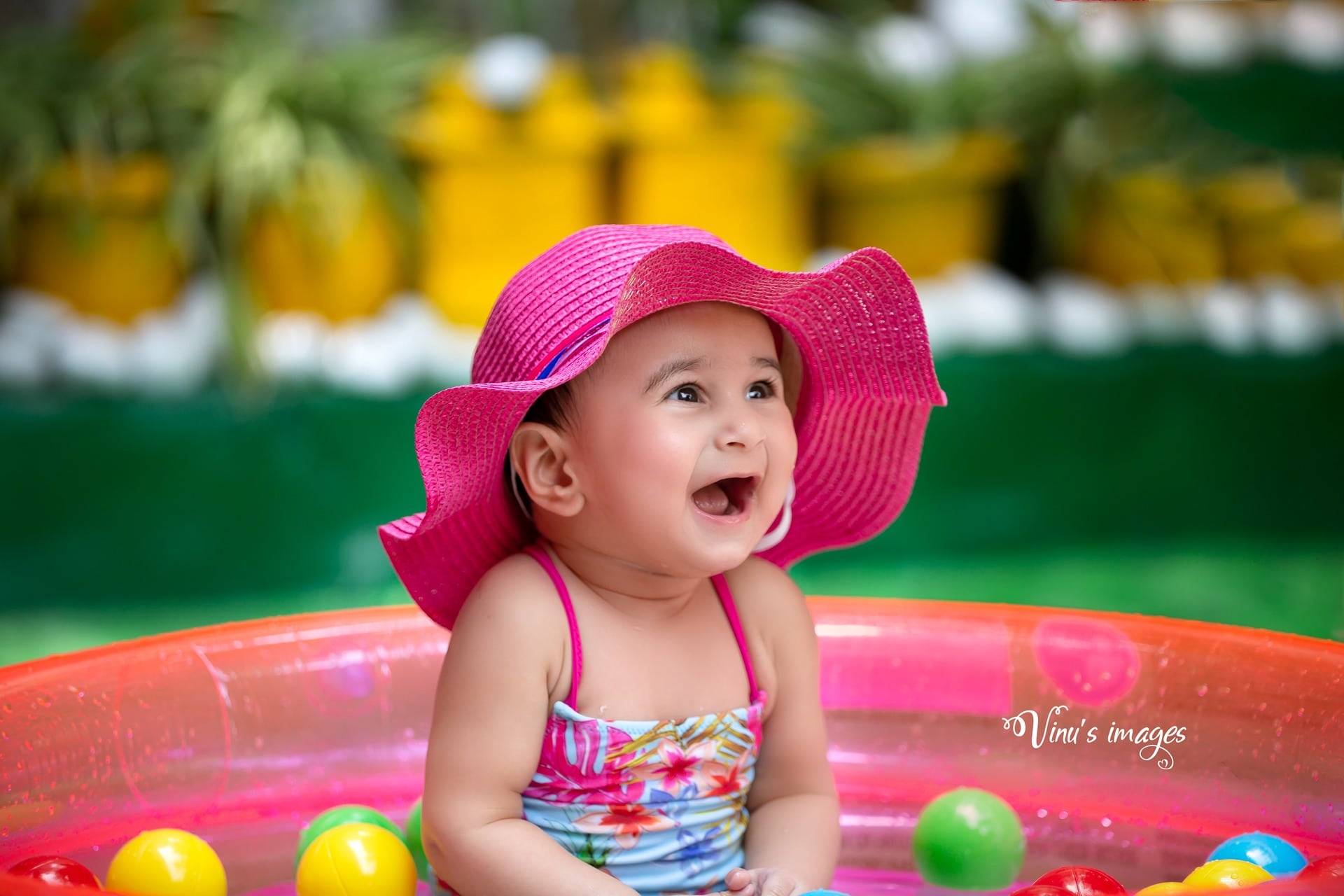 Fun colorful theme for baby girl photoshoot in Delhi by vinus images photographer