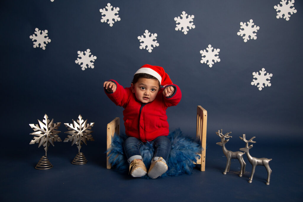 Baby boy photoshoot in santa costume, photography by Vinus Images in Delhi