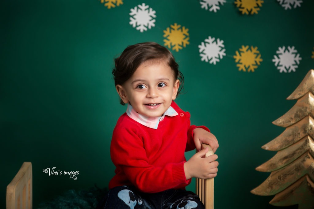 Christmas theme for baby boy photoshoot in Delhi, photography by Vinus Images